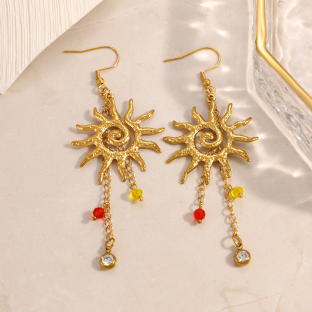 Boucles d'oreilles pendantes pour femme, en acier inoxydable doré, imperméables, en forme de soleil, ornées de strass.