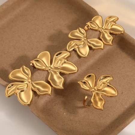 Boucles d'oreilles élégantes en acier inoxydable imperméables à motif floral pour femmes