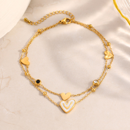 Bracelet de cheville simple en acier inoxydable imperméable couleur or avec strass en forme de cœur