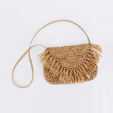 Sacoche de selle femme en papier tissé à pompons style vacances