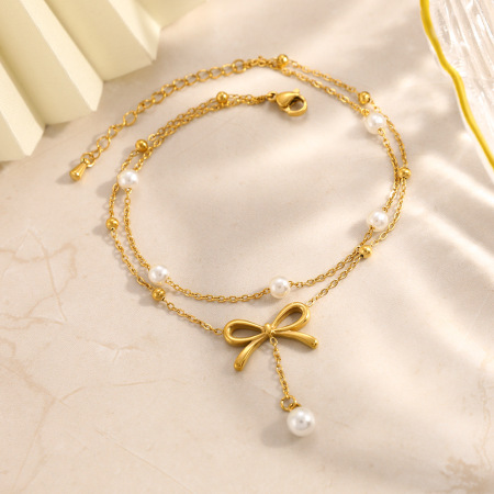 Bracelet de cheville en acier inoxydable imperméable avec nœud papillon et perles couleur or