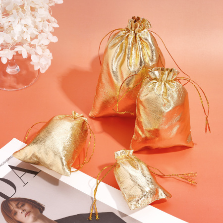 Pochette à bijoux dorée à cordon (1 pièce) 2