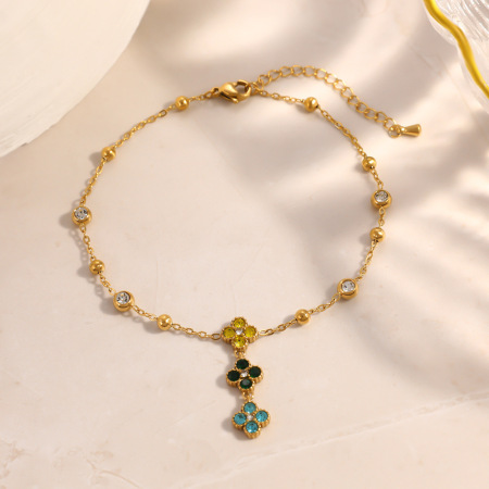 Bracelet de cheville élégant en acier inoxydable imperméable couleur or avec motif floral et zircon