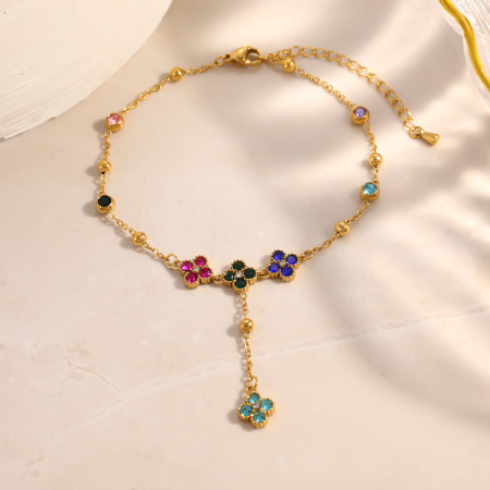 Bracelet de cheville élégant en acier inoxydable imperméable couleur or avec motif floral et zircon