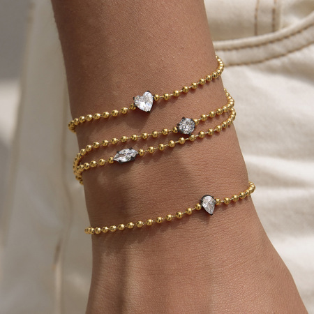 Bracelet chaîne femme luxueux en acier inoxydable, orné d'un cœur en goutte d'eau et de zircon doré, étanche.