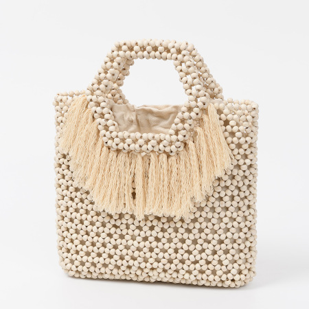 Sac carré pour femme en bois ajouré, orné de pompons tissés de couleur unie, style vacances