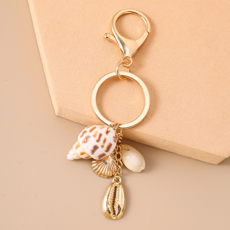 Porte-clés romantique en résine, style océanique, perles, coquillage et étoile de mer. Collection vacances. Porte-clés coquillage et étoile de mer. Collection romantique. 2