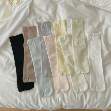 Chaussettes mi-mollet élégantes et unies à rebond élevé