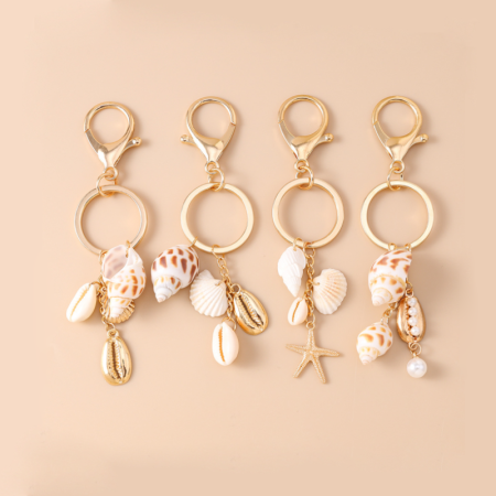 Porte-clés romantique en résine, style océanique, perles, coquillage et étoile de mer. Collection vacances. Porte-clés coquillage et étoile de mer. Collection romantique.