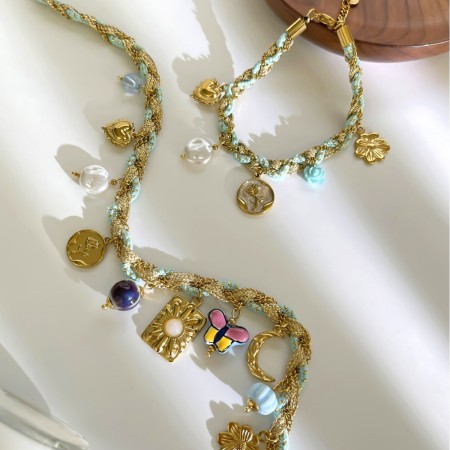 Colliers tressés rétro pour femmes, en acier inoxydable, couleur or, avec motif papillon et fleurs.