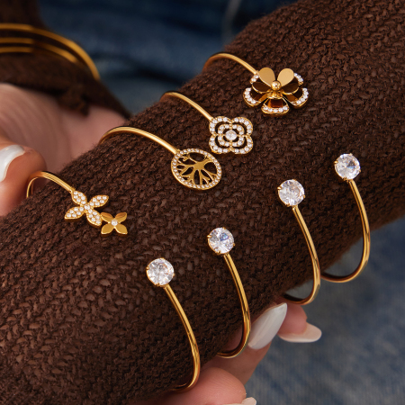 Bracelet manchette élégant en acier inoxydable, étanche, couleur or, orné de zircon et serti de fleurs.