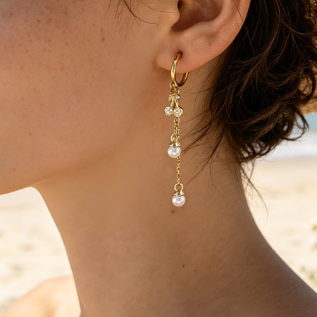 Boucles d'oreilles pendantes élégantes en acier inoxydable, imperméables, couleur or, avec zircon, en forme d'étoile de mer.