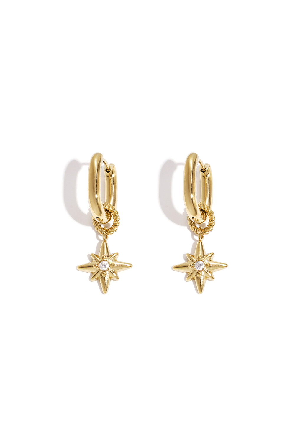 Boucles D'Oreilles Avec Une Étoile Filante Sur Une Petite Bague
