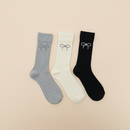 Chaussettes mi-mollet élégantes unies à strass