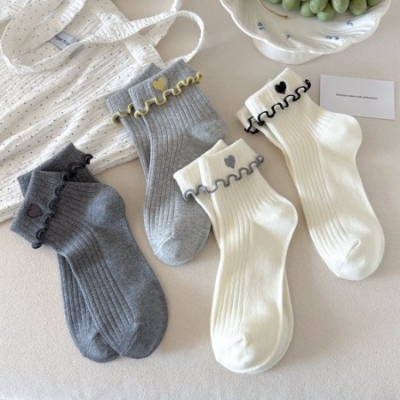 Chaussettes montantes basiques à petits coussins, couleur unie, motif cœur.