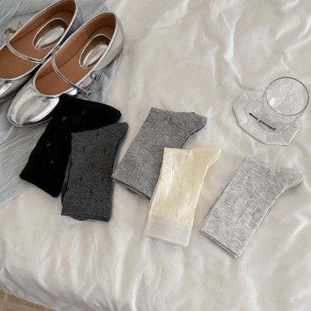 Chaussettes mi-mollet à motif géométrique uni, légèrement rebondissantes