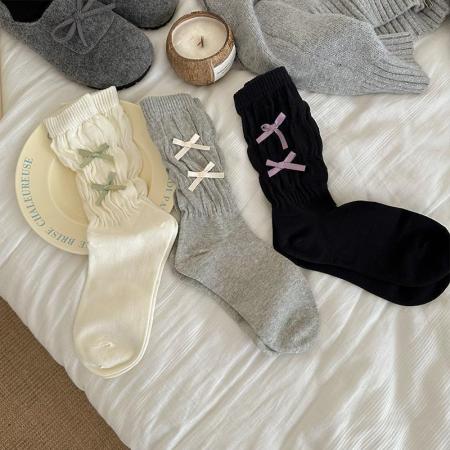 Chaussettes mi-mollet élégantes et unies à rebond élevé