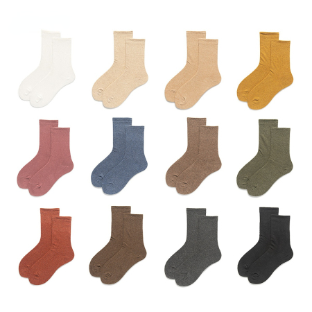 1 paire de chaussettes mi-mollet basiques et polyvalentes de couleur unie
