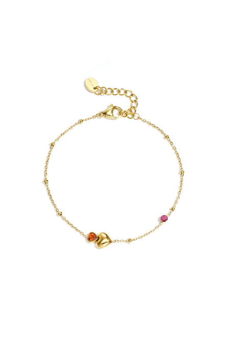 Bracelet orné de cœurs, de pierres colorées et de pois