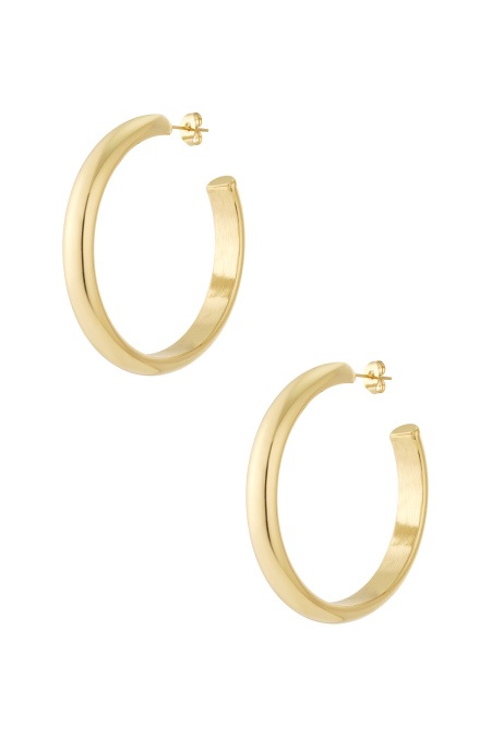 Les boucles d'oreilles créoles incontournables