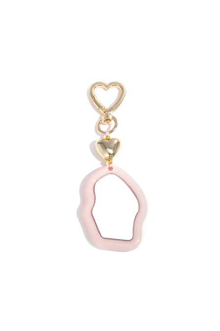 Joli porte-clés miroir irrégulier avec détail en forme de cœur