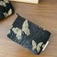 Trompette.Papillon en or noir 
