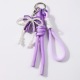 1 porte-clés noeud en cuir imitation perle violet Image2