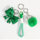 1 porte-clés noeud strass pompon vert