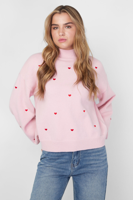 Pull tricoté à cœurs