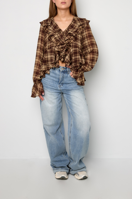 La blouse à carreaux