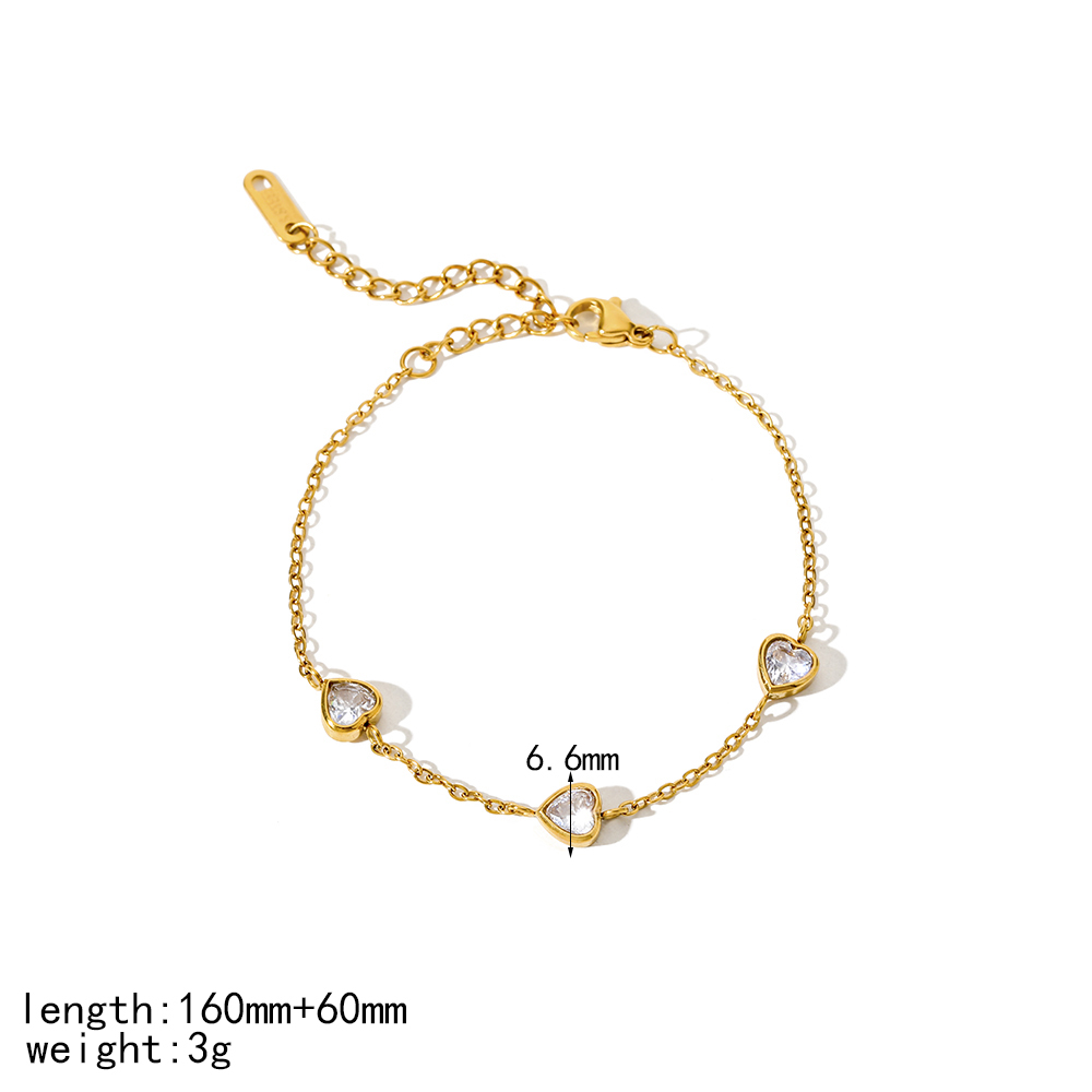 Un Simple Bracelet En Acier Inoxydable Plaqué Or  Avec Un Cœur En Forme De Pêche Et Un Zircon Pour Un Usage Quotidien Pour Les Femmes Image7
