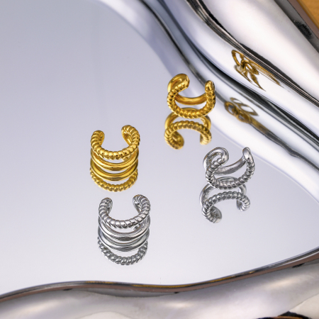 1 paire de clips d'oreilles élégants en acier inoxydable plaqué or, à motif géométrique torsadé, pour un usage quotidien.