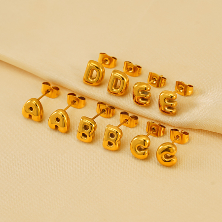 1 paire de boucles d'oreilles à tige élégantes en acier titane plaqué or pour femme, série simple