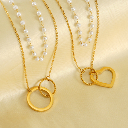 1 paire de colliers de perles à double chaîne superposés de mode française transfrontalière, bijoux de luxe légers en acier inoxydable, collier en acier titane assorti pour femmes