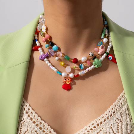 Collier de perles pour femme, collection Designable Series Vacation, en acier inoxydable, couleur or, orné de pierres transparentes colorées. 2
