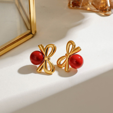 1 paire de boucles d'oreilles puces pour femme, style rétro nœud papillon, sphère rouge, en acier inoxydable étanche couleur or. 2