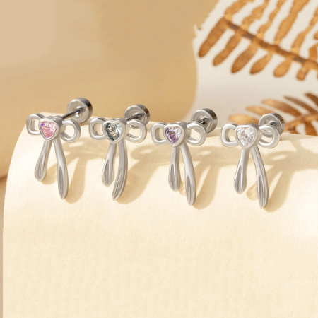 1 paire de boucles d'oreilles à tige en acier titane sans placage, motif nœud papillon, série simple, pour femme, zircone cubique