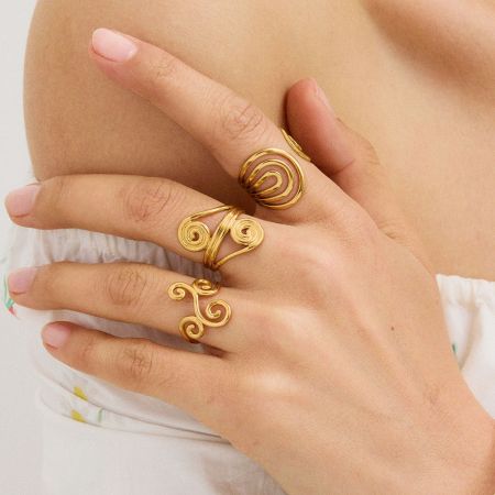 Bague ajustable pour femme, collection moderne, en acier inoxydable, couleur or, avec motif spirale. 2