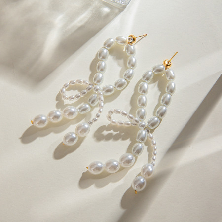 1 paire de boucles d'oreilles élégantes et luxueuses en acier inoxydable plaqué or avec perles artificielles pour femme