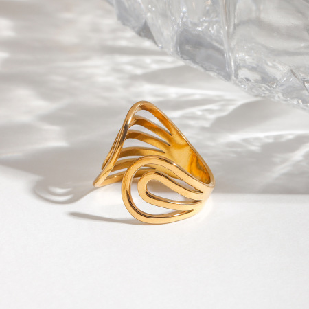 Bague ajustable pour femme, collection moderne, en acier inoxydable, couleur or, avec motif spirale.