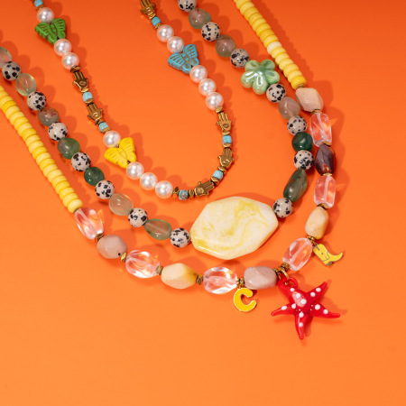 Collier de perles pour femme, style tropical, motif étoiles de mer colorées, en acier inoxydable, couleur or, étanche (1 pièce)