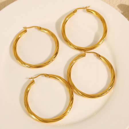 1 paire de boucles d'oreilles créoles élégantes géométriques en acier titane plaqué or pour femmes, série classique