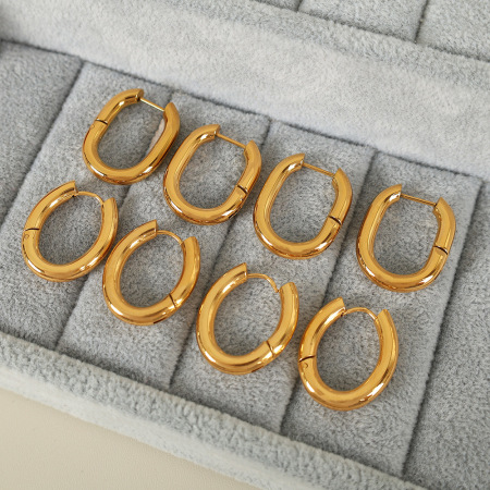 1 paire de boucles d'oreilles créoles classiques en acier inoxydable plaqué or pour femme, série simple