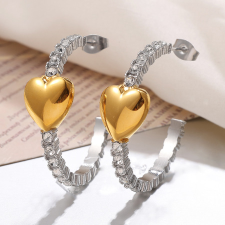 1 paire de boucles d'oreilles créoles élégantes en acier titane couleur or pour femme, série Simple