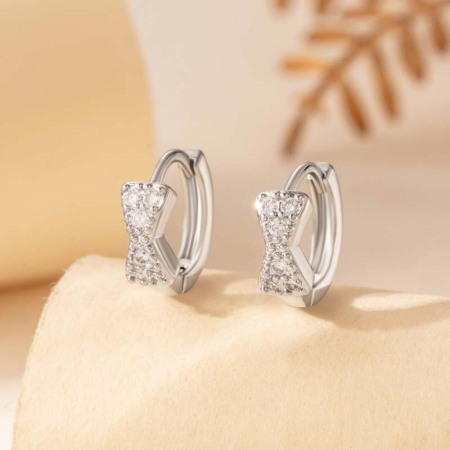1 pièce de boucles d'oreilles créoles pour femme, série Simple, nœud papillon, cuivre sans placage, zircone