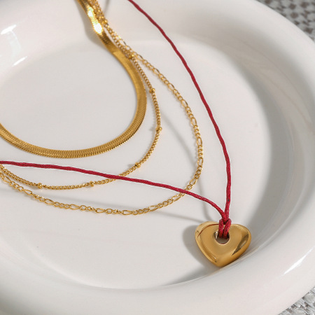 Collier à plusieurs rangs pour femme, style classique romantique, en acier inoxydable, couleur or, forme de cœur.