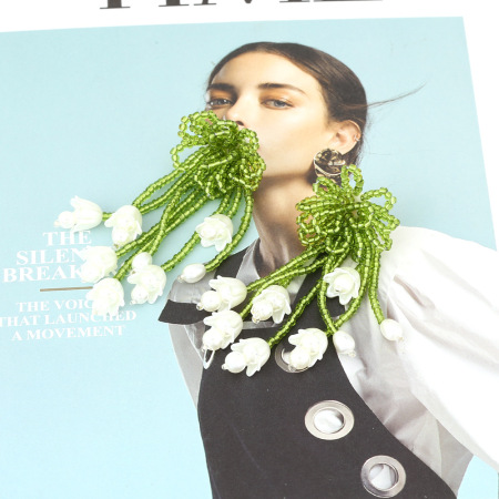 1 paire de boucles d'oreilles romantiques à pompons et perles en forme de fleur 2