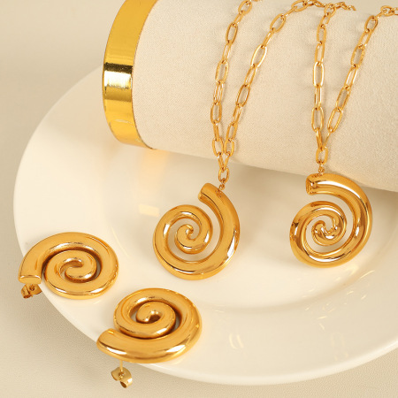 ensemble de boucles d'oreilles vortex en acier inoxydable couleur or