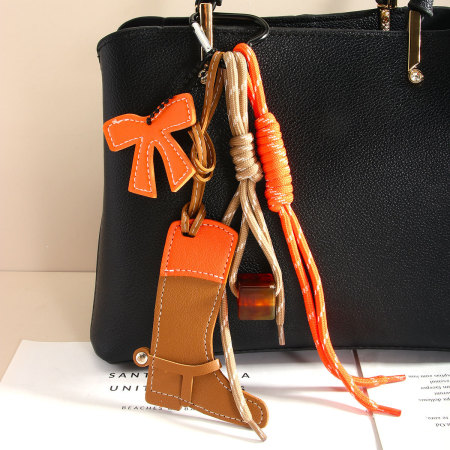 Accessoires de bottes colorblock style cowboy western et breloques de sac pour femme