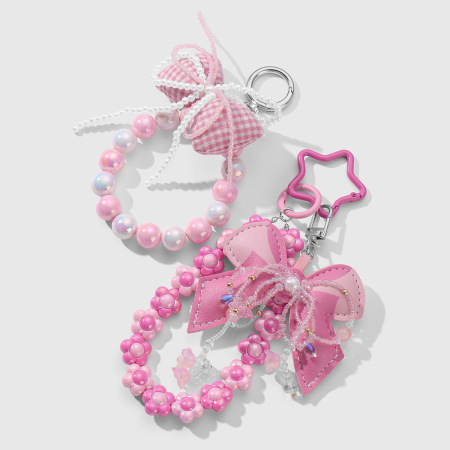 Charms de sac en forme de nœud papillon en perles